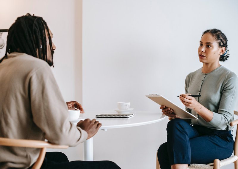 Why Should You Hire A Freelance Website Designer For Your Startup? 3 An interviewer screening a website designer applicant.