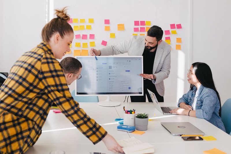 How to Hire a UX Designer in 2024 - a Complete Guide 3 hiring a ux designer who has teamwork